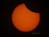 partial-eclipse-with-sunspots